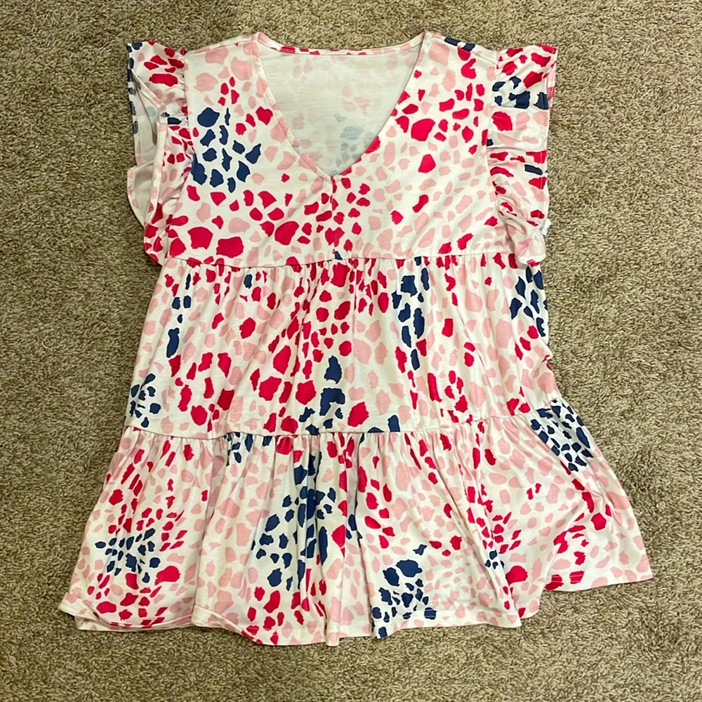Cute colorful patterned shirt. Only worn once.